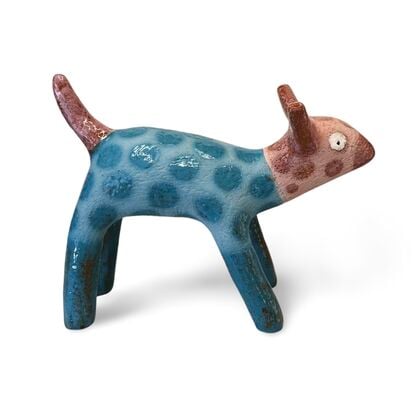 This stoneware sculpture features a stylised puppy.