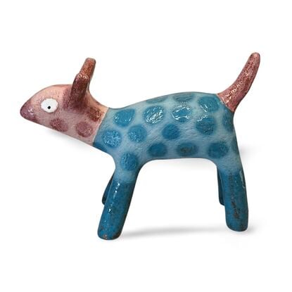 This stoneware sculpture features a stylised puppy.