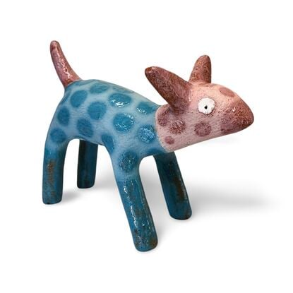 This stoneware sculpture features a stylised puppy.