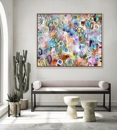 A soft, quiet, but energetic painting.  Soft hues are painted beneath, with drawings of circles and ovals in contrasting paint, crayon, pencil in various sizes.