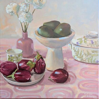 A composition of China crockery, flowers, eggplants and avocados 