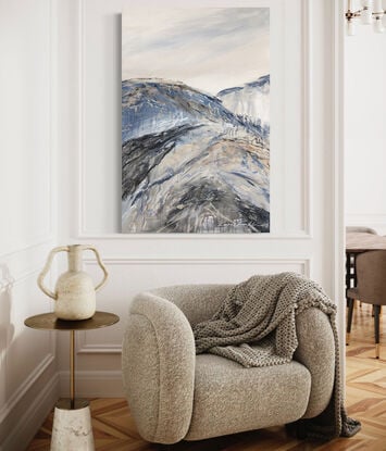 A large abstract landscape of the Victorian Alpine region in mixed media in dark navy blue, cream, beige and grey.