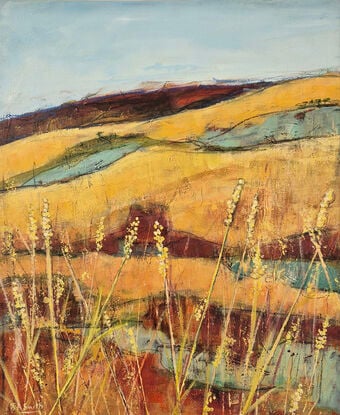 rich golden and red ochre landscape with pale yellow highlights and golden yellow grasses in the foreground