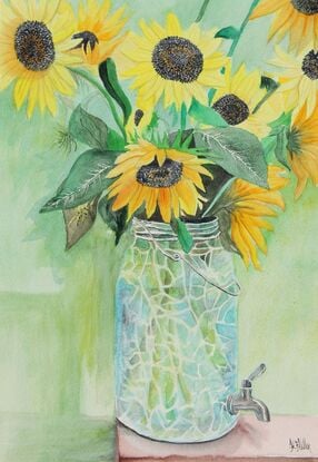 Yellow sunflowers in crackled glass jar