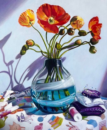 Poppies in blue vase with shadow.