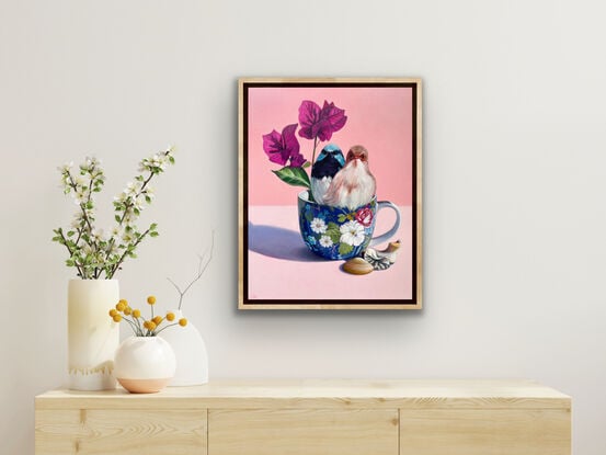 Fairy-wren couple on blue floral teacup.