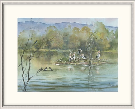 Watercolour painting of a lake, billabong with pelicans, birds, trees and escarpment in the background.