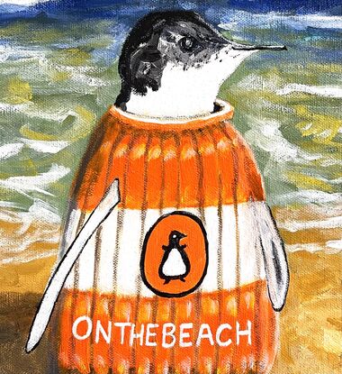 A solitary penguin, wearing a knitted orange and white jumper resembling a Penguin Classic book, features the title "On The Beach" inspired by Neville Shute's novel. This lone penguin stands at the shoreline, perfectly embodying the playful wordplay of being "on the beach."