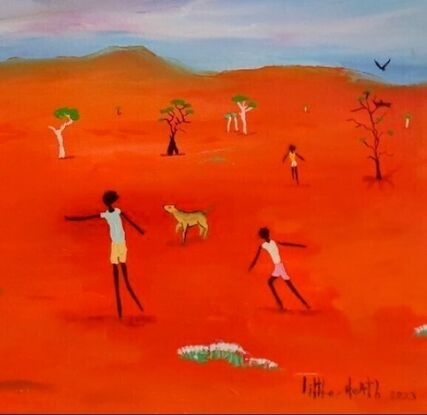 Youths playing Footy in Outback Australia.