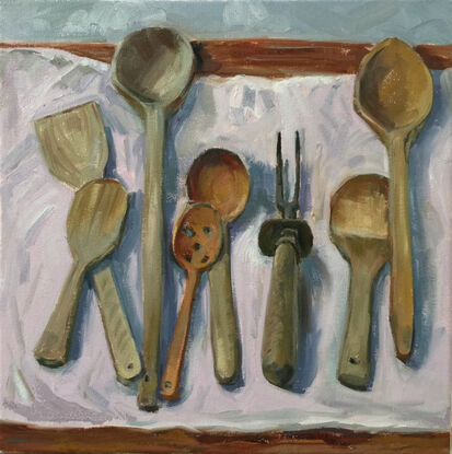 The painting depicts a collection of wooden kitchen spoons on a cloth with a kitchen carving fork.
I can be read as a metaphor for the odd one out or danger.