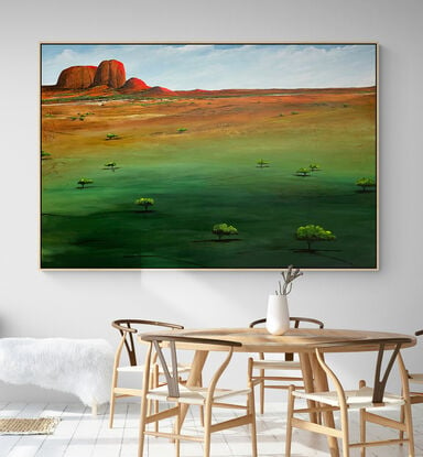 Dusks Serene Embrace by Tania Chanter  is a textured abstract landscape that captures the tranquil warmth of an evening scene in rich green and ochre tones with a mountain ridge along the horizon.