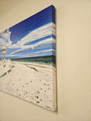 Seascape oil painting of the view of Semaphore beach with the yellow lifeguard tower. The sand is rippled and the ocean is in the background.