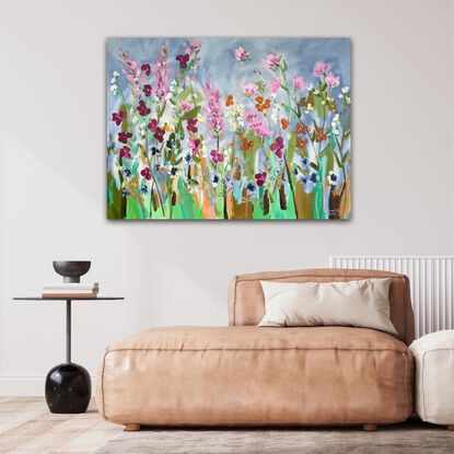 A colourful painting of flowers. Energetic and colourful.