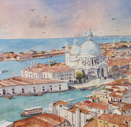 looking down on the city of Venice with it's architectural history, the red roofs and chimneys, the Santa María della Salute along the azure blues of the Grand Parade and beyond