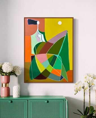 Abstract of female with a colorful dress and a full moon.