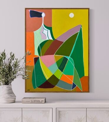 Abstract of female with a colorful dress and a full moon.