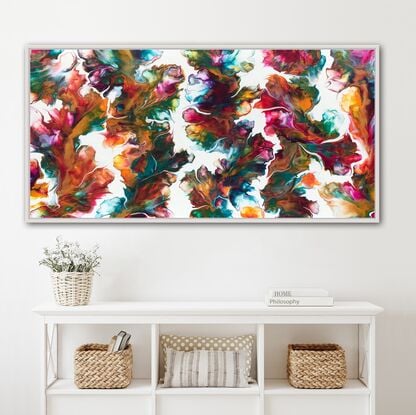 Describing a floral abstract artwork featuring shades of pink, magenta, white, turquoise, and yellow, fluidart on a white background