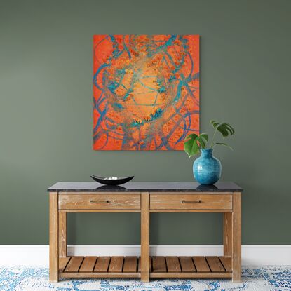 This abstract contemporary painting is a dynamic representation of nature, dominated by vibrant  orange hues and complemented by lush blue tones. The artist employs a heavy texture, adding depth and dimension to the artwork, creating a visually engaging and evocative piece.