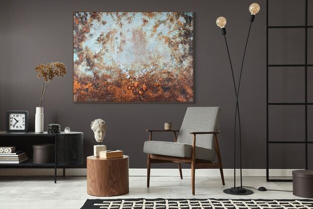 This abstract contemporary painting is a dynamic representation of nature, dominated by vibrant  green hues and complemented by orange tones. The artist employs a heavy texture, adding depth and dimension to the artwork, creating a visually engaging and evocative piece.