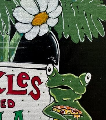 A jar of flowers with a frog eating pizza.