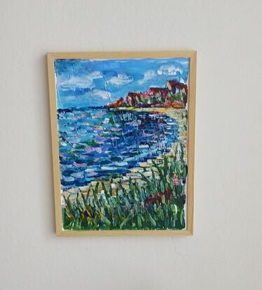 An impression of a beach .         Painting has a simple pine frame.     