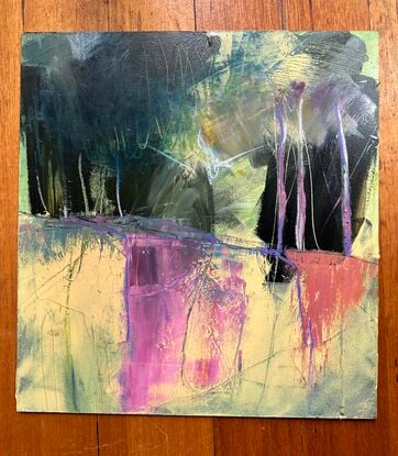 Abstracted painting with a pink and beige foreground and dark area suggesting trees and a forest. 