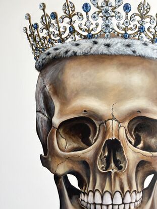 Photo realistic skull with diamond crown on white background 