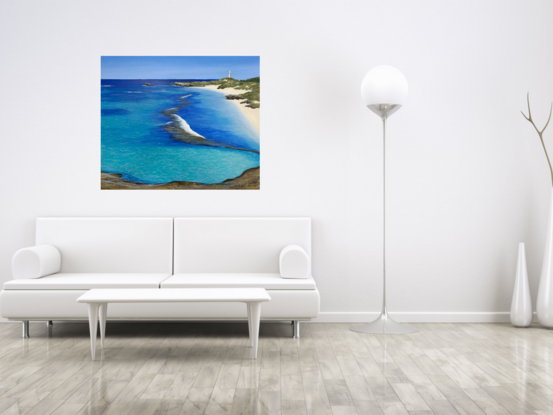 This artwork predominately reflects the blue and turquoise waters of Rottnest Island with Bathurst Lighthouse, rocks, sand and greenery in the background. The primary colours are turquoise, blue, yellow and brown and the ripples in the sand and water are light yellow and pale blue. 