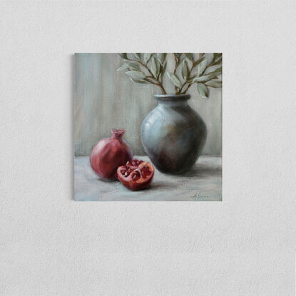 Still life with pomegranate and vase