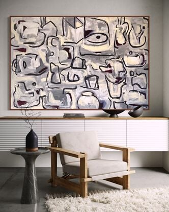 abstract of table with objects in beige, maroon, grey, white and highlights of maroon