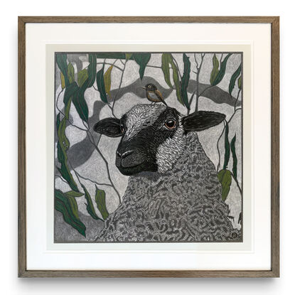 A framed mixed media drawing of a Sheep and a Little Brown Bird amongst eucalyptus on 360 gsm pastel paper, rendered in coloured pencil and oil pastel