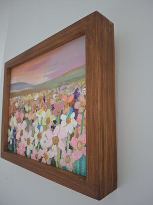 abstract textured flowers in a wooden frame