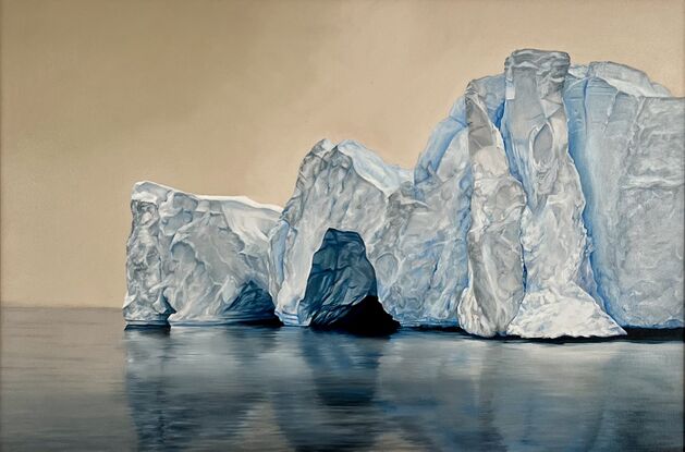 This oil painting portrays a massive iceberg with intricate details, reflecting on the still surface of the water. The soft beige sky contrasts beautifully with the cold blue and white hues of the ice, creating a serene and quiet atmosphere.