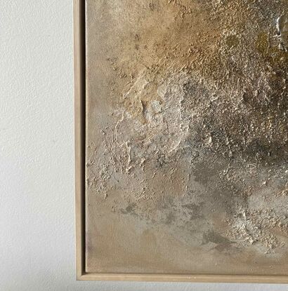 A mostly neutral coloured textured abstract painting