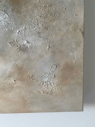 A mostly neutral coloured textured abstract painting