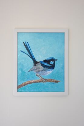 Thick textured oil painting of a Superb Fairywren perched on a branch.  This small bird has a pale blue crown, cheek, and back with a strong black line from the bill through the eyes and around the back of the head.