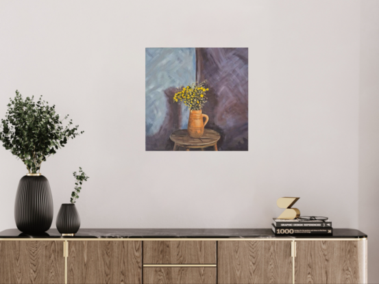 yellow flowers in terracotta vase on wooden stool