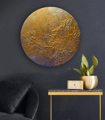 Round textured gold abstract.