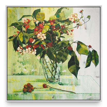 A framed limited edition canvas print in a white wood floating frame of an original still life painting of flowers in yellows, greens , reds and oranges in a glass vase