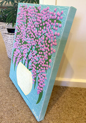 Textured pink impasto wattle flowers in a yellow vase with a sky blue background textured abstract 