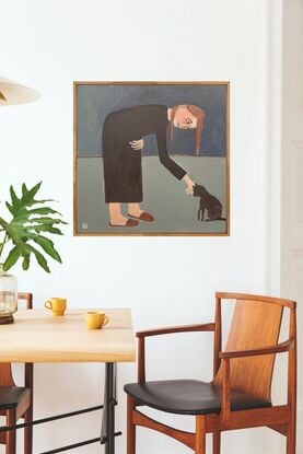 The painting depicts a woman bending over to pat a black cat. 