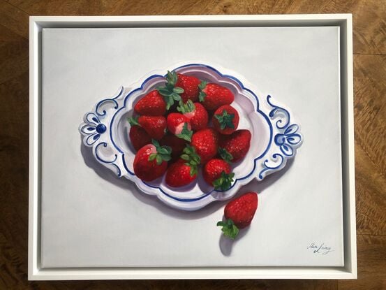 Strawberries on a vintage plate. 