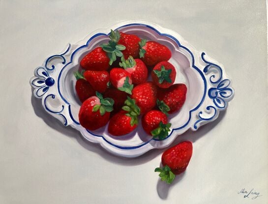 Strawberries on a vintage plate. 