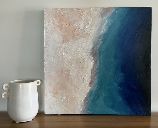 Painting our beautiful coast makes me feel so relaxed and happy. I love painting the different shades of blue from shallow to the deep waters, in contrast to the peachy white of the sand that surrounds it. So peaceful and beautiful.