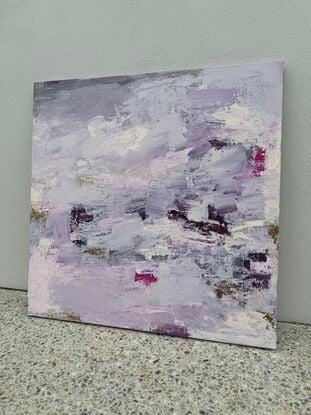 Layers of pink, purple and white paint with lashings of metallic gold paint. 