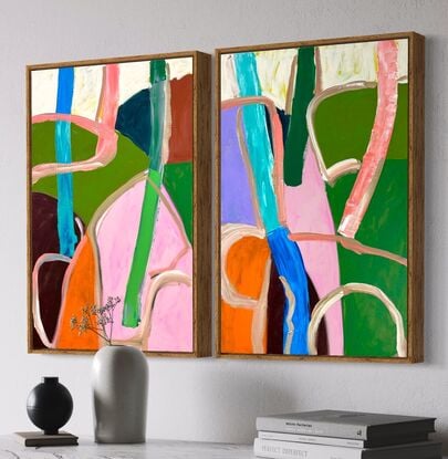 two canvases of abstract shapes reminiscent of hills and trees and a meandering road.