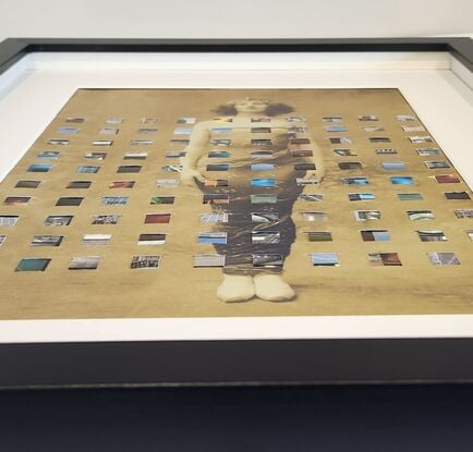 various blue squares woven in a grid formation on an image of a vintage dressed sepia toned woman in black frame and white mat