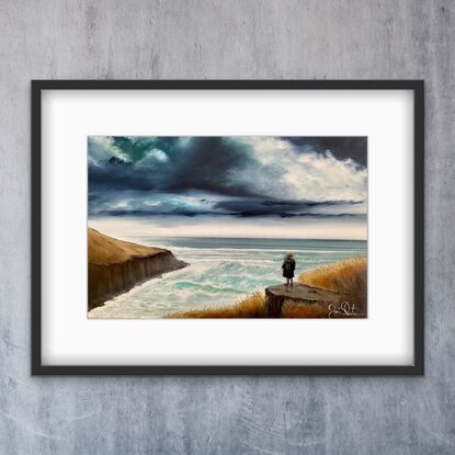 Upon the shore young boy standing and gazing horizon