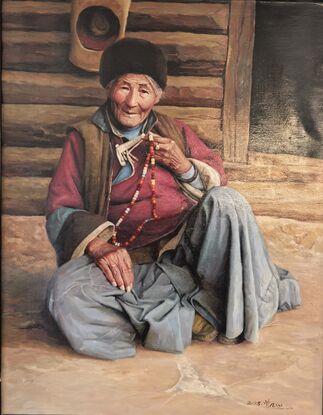 A detailed oil painting of an elderly woman sitting in front of a wooden cabin. She is wearing traditional ethnic clothing and holding a string of prayer beads. Her face is gently smiling, with a calm and kind expression. The background of the wooden cabin and her posture convey a peaceful, rural lifestyle. Soft lighting emphasizes the textures of her face and clothing.