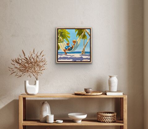 Two boys in a hammock on the beach with palm trees and ocean 